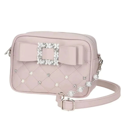 Blush pearl quilted crossbody bag with rhinestone bow buckle and adjustable strap